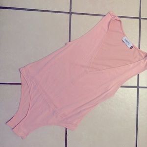 Pink etiquette sleeveless body suit tank in size medium!